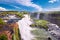 Iguazu waterfalls in Argentina, view from Devil`s Mouth. Panoramic view of many majestic powerful water cascades with mist. Side