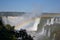 Iguazu waterfalls rainbow on sunny