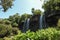 Iguazu Waterfalls in a sunny summer day. Landscape, holiday, vacation. Photo taken in Misiones, Iguazu National Park. Rainforest,