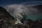 Ijen volcano crater and sulphur mining at the night.