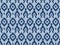 Ikat pattern as ethnic fabric in blue tone with pavillion and rectangle design. Wallpaper seamless pattern design in navy blue.