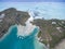 Ile aux Cerfs, Deer Island from above. Landscape with ocean and beach with yacht in background. Mauritius