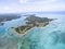 Ile aux Cerfs, Deer Island from above. Landscape with ocean and beach, yacht in background. Mauritius