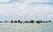 Ile aux Cerfs, Deer Island landscape with ocean and tree in background. Mauritius