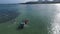 ILE AUX CERFS, MAURITIUS - DECEMBER 06, 2015: Flying with drone over the Indian Ocean and boat with local People. Ile aux Cerfs