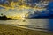 Ilhabela beach Pereque with boat in the sea at sunset - Sao Paulo, Brazil - wide angle photo