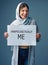 Ill never apologize for being myself. Studio portrait of an attractive young woman holding up a sign reading