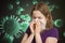 Ill woman has flu and is sneezing. Many viruses and germs flying around