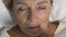 Ill woman suffering strong headache, chronic migraine problem, face close-up