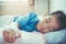 Illness asian child admitted in hospital with saline intravenous