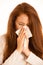 illness flu - Young Woman Lying On Bed Infected With Allergy Blowing Her Nose