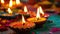 Illuminate Diwali nights with colorful clay diya lamps, spreading joy and warmth. Ai Generated