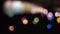 Illuminated abstract colorful bokeh circular light .