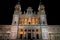 Illuminated Almudena Cathedral facade in Spanish capital Madrid