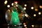 Illuminated angel figure in glass bulb, soft boke christmas ligh