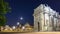 Illuminated Arc de Triomphe du Carrousel at night timelapse