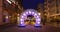 Illuminated arch on the street of Wroclaw