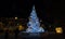 Illuminated ball of Christmas tree in the old harbor porto antico of Genoa, Italy.