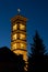 Illuminated bell tower in the blue hour