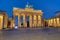 The illuminated Brandenburger Tor at dawn