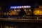 Illuminated building on the river Salzach in Salzburg, Austria,