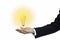 Illuminated bulb in businessman hand  liken his new idea