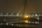 Illuminated cable-stayed bridge over the Yamuna River at night. Signature Bridge. Delhi India