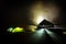 Illuminated camping tents at night in alpin zone