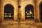 Illuminated cathedral in Munich seen through arch entrance of a building in Germany