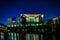 The illuminated chancellors office seen from the river Spree