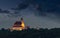 Illuminated Christian Church on hill at dusk, Ptujska Gora, Slovenia