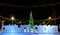 Illuminated christmas tree and Happy New Year greeting in Russian