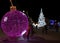 Illuminated Christmas tree in the old harbor porto antico of Genoa, Italy.