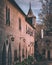 Illuminated cobblestone alleyway in a picturesque medieval town