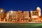 Illuminated colorful italian style buildings on blue night background in Portofino Hotel at Universal Studios area 1