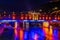 illuminated covered bridge reflecting on Osam river in the bulgarian city Lovech...IMAGE