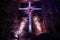 Illuminated cross in famous underground Salt cathedral of Zipaquira in violet light, Colombia