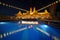 Illuminated deck of ship at evening.