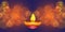Illuminated diyas Oil Lamps and firecracker  rocket  on blurred bokeh background for Diwali celebration