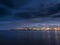 Illuminated dock area of Dublin port at night, Dark dramatic sky. Night shot. Transportation industry, Import and export gate of