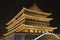 Illuminated Drum Tower at ancient city wall by night time, Xian, Shanxi Province, China