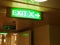 Illuminated Emergency Exit sign corridor