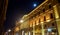 Illuminated facade of the building and moon