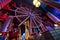 Illuminated ferris wheel in an indoor playgroud