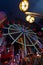 Illuminated ferris wheel in an indoor playgroud