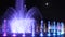 Illuminated Fountain at Full Moon Night