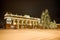 Illuminated Gates of Gorky Park and Christmass Trees in Early Winter Morning