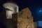 Illuminated Greek Orthodox Church in the Castle Town of Monemvasia Island, Greece, at Night. Moonlight Reflects on Dark Waters