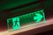 Illuminated green emergency exit sign