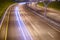 Illuminated highway at night.